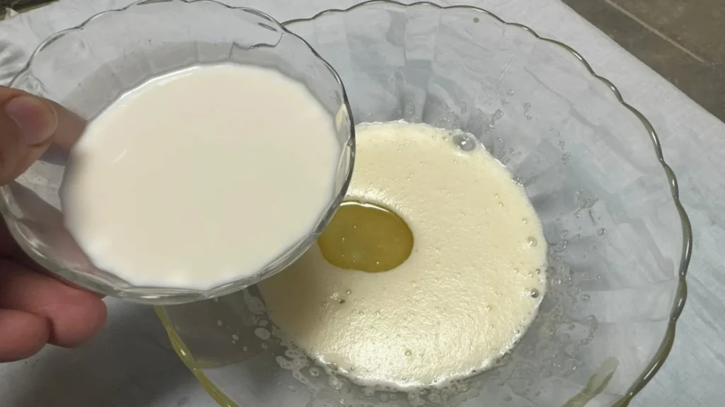 Add milk in muffin paste Add milk in muffin paste